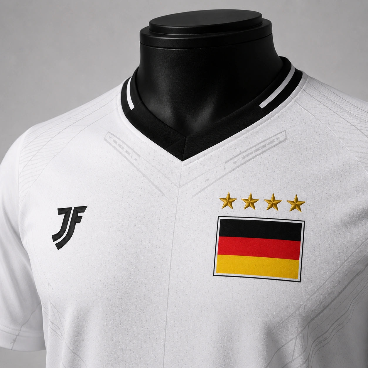Germany-inspired custom soccer jersey chest logo and fabric detail by JerseyFamiliar